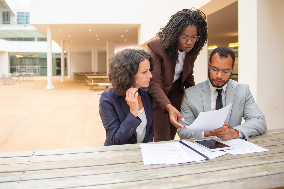 business-team-three-studying-documents_74855-1495.jpg